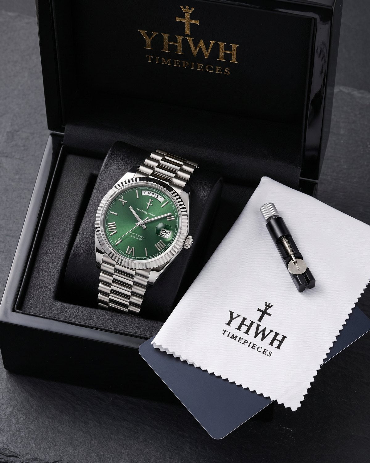 YHWH presentation box with the watch, cleaning cloth, warranty card and sizing tool
